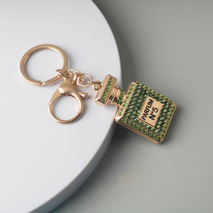 Nieuwe luxe mode schattige parfumflesvormige hanger sleutelhanger dames sleutelhanger kristallen sleutelhangers - Product Image 5