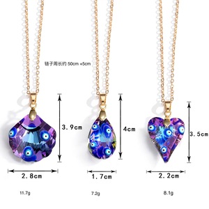 Collier avec pendentif en cristal en forme de cœur irisé Evil Eye, 3,5 cm, pour femmes, à porter au quotidien - Product Image 1