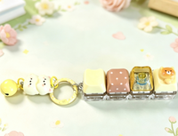 Mini clavier anti-stress portable avec breloque clavier, jouet sensoriel et pendentif clicker avec motif de dessin animé mignon, idéal comme cadeau pour étudiants