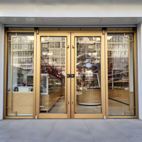 Porte d'entrée double battante robuste en alliage d'aluminium blanc sur mesure, style KFC, pour restaurant de restauration rapide