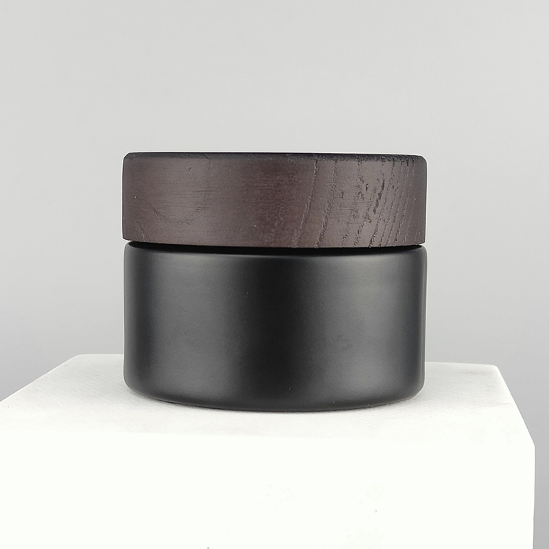 frosted black glass jar with dark color lid