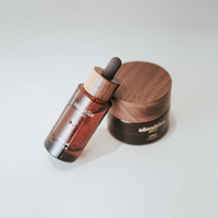 Ensemble de bouteilles en verre à couvercle en noyer personnalisé haut de gamme pot de crème à couvercle en bois foncé emballage en verre personnalisé personnalisé