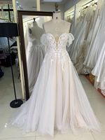 Robes de bal ivoire en gros 2026 2027 Robe de soirée Manches bouffantes Appliques Tulle scintillant Robe de bal