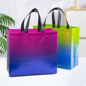 กระเป๋าถือสานสำหรับผู้หญิงแบบพกพา สีไล่ระดับ กระเป๋าเดินทางชายหาดสำหรับผู้หญิง สินค้าขายดี พิมพ์โลโก้ กระเป๋าของขวัญ - Product Image 1