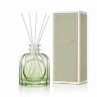 Diffuseur de parfum en verre rayé unique avec fenêtre en relief pour une fragrance d'ambiance luxueuse