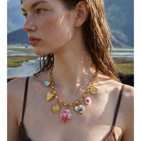 Collier chaîne à maillons en acier inoxydable plaqué or JINYOU 5875 avec pendentif cœur soleil en émail et coquillage naturel rose pour femme