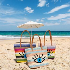 กระเป๋าชายหาดลายทางสีสันสดใสสำหรับฤดูร้อน  กระเป๋าโท้ทลายตาปีศาจขนาดใหญ่  กระเป๋าเดินทางกลางแจ้งลายตาสีฟ้า  กระเป๋าสานแบบกำหนดเองได้ - Product Image 1