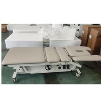 Table de décompression de flexion spinale électrique et manuelle, banc de massage cervical, lit de traction chiropratique pour le dos et le bas du dos