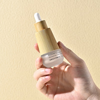 Botol tetes kaca 30ml dengan cetakan tekstur kayu untuk Serum kosmetik dan wadah isi ulang minyak esensial