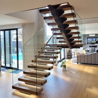 Escalier intérieur flottant moderne en U avec marches en bois massif, garde-corps en verre, monopoutre, forme et taille personnalisées