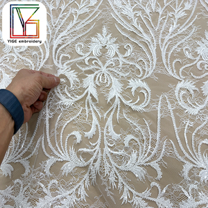 Nouveau tissu en dentelle française brodée de fleurs, tissu en dentelle blanche perlée et pailletée pour robes de mariée - Product Image 4