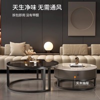 Table basse moderne en acier inoxydable avec plateau en dalle de roche ronde, rangement et fonction extensible pour le mobilier de salon