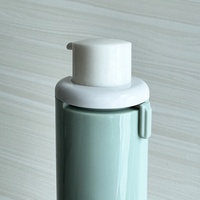 Flacon pompe airless rotatif en acrylique cylindrique de 30 ml avec collier en ABS pour emballage cosmétique