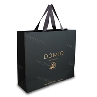 Sacs-cadeaux personnalisés en or gaufré UV de luxe doré Sacs en papier exquis pour mariage Sacs en papier noir professionnel