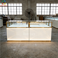 Vitrine à bijoux en verre trempé sur mesure avec éclairage LED chaud et système de verrouillage de sécurité pour magasins de détail et centres commerciaux