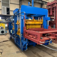 Machine à fabriquer des blocs de béton à faible bruit QT8-15 avec système de vibration stable pour la production de pavés creux et pleins