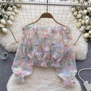 Chemisiers polyvalents pour femmes, coupe ample et amincissante, à une épaule, manches longues, en maille à fleurs 3D, collection été 2026, vente en gros - Product Image 3