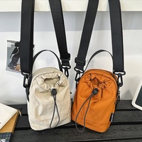 Sac seau unisexe matelassé à cordon de serrage, imperméable, bandoulière, personnalisable, tendance pour homme, en nylon