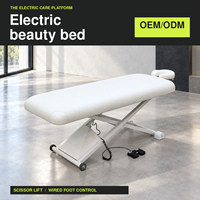 Table de massage électrique réglable en hauteur, lit de beauté avec repose-visage et commande au pied pour les soins en spa et salon, OEM ODM, vente en gros