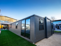 Maisonnette préfabriquée modulaire de 20 pieds en conteneur, 2 à 4 chambres, extensible, style Mid-Century Modern, avec panneaux sandwich, pour bureau/atelier