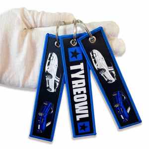 Promotional <b>Custom</b> Woven Embroidery Label High Quality Keychains Ring Fabric Personalized Fly Jet Tag Embroidered Keychain - Product Image 1