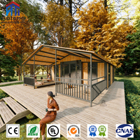 Maison conteneur écologique extensible, prête pour l'énergie solaire, avec toit végétal pour des solutions de vie autonome et durables hors réseau