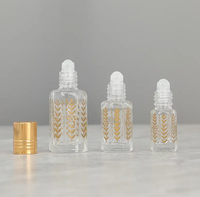 Top Grade 3ml 6ml 12ml vide doré octogonal huile essentielle rouleau bouteille feuille-motif verre rouleau sur bouteille de parfum