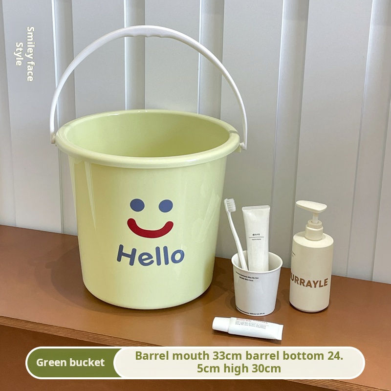 Seau vert souriant