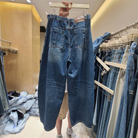 Nouvelle collection automne 2026 – Jean large délavé bleu effet usé, coupe décontractée chic, style deux pièces, ourlet effiloché, pour femme – Vente en gros