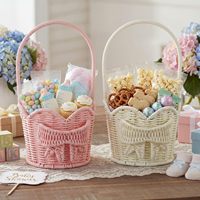 Panier en rotin tressé à la main avec poignée en forme de nœud, idéal pour la décoration de fêtes et les cadeaux