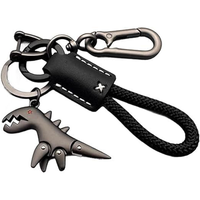 Breloque en alliage d'aluminium haut de gamme et mignonne à l'effigie d'un dinosaure de dessin animé, assortie à un bracelet tressé à la main, un porte-clés dinosaure pour sac à dos et étui de téléphone