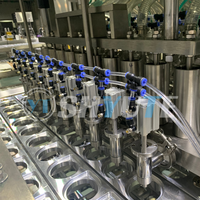 Machine de remplissage et de scellage de gobelets d'eau minérale