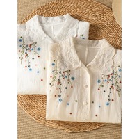 Chemisier féminin blanc à manches longues, col Peter Pan, broderie florale colorée en dentelle de coton, style Fairycore, vente en gros, été 2026