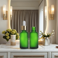 Flacon d'huile essentielle en verre mat vert vide de luxe Fuyun, flacon cosmétique européen givré, flacon compte-gouttes rond en verre doré métallique