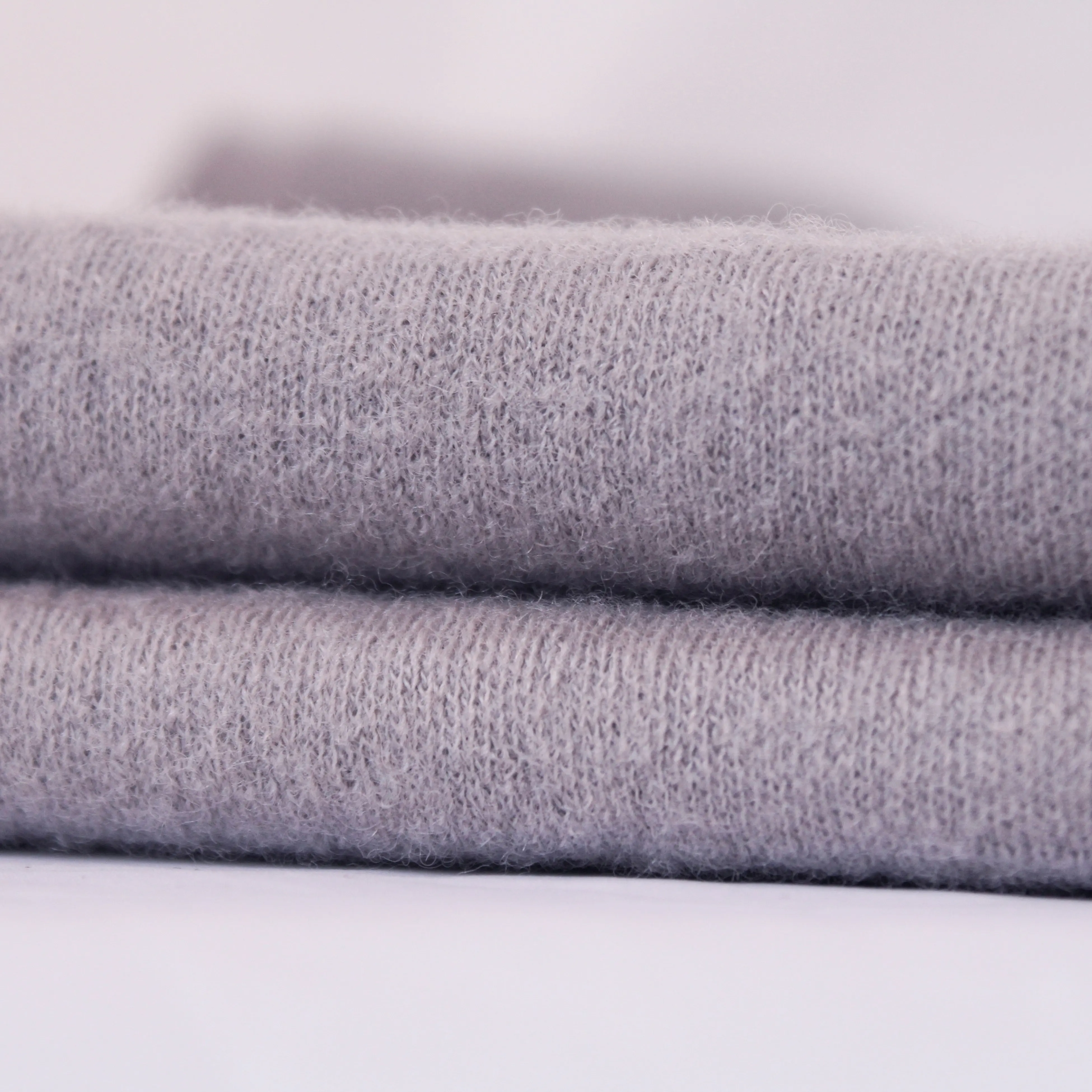 2025 primavera Super morbida a buon mercato prezzo di fabbrica di alta qualità a basso MOQ 100% lana bollita tessuto a maglia per vestito cappotto