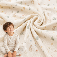 Tela de punto gofrado de algodón y lyocell estampada a medida, textil térmico de textura suave para capas base y conjuntos de descanso para niños, por rollo