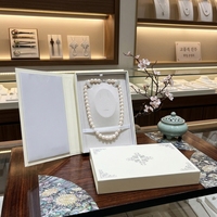 Boîte de rangement pour collier de perles en forme de livre, boîte de présentation de bijoux à couvercle rabattable, emballage en carton luxueux et minimaliste