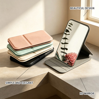 Miroir de maquillage rectangulaire pliable de style pochette, finition argentée, cadre en cuir PU, support réglable, couleurs pastel, vente en gros