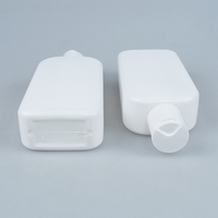 Bouteille plate en PE de 200 ml (6,76 oz) pour distributeur de lotion corporelle, conteneur de shampoing d'hôtel avec bouchon à disque