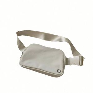 Nouvelle sacoche unisexe élégante et simple, sac banane coloré avec impression de logo, en tissu doux/coton, idéal pour les voyages quotidiens et les activités de plein air - Product Image 1