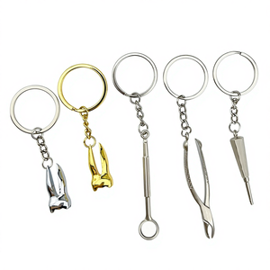 Porte-clés dentaire en alliage de <span class=keywords><strong>zinc</strong></span>, design moderne et simple, en forme de dents simulées, cadeau promotionnel pour clinique dentaire transfrontalière, outil dentaire - Product Image 1