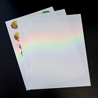 Papier autocollant transparent et holographique superposé étanche A4 arc-en-ciel PET PVC vinyle imprimable Laser pour imprimante à jet d'encre