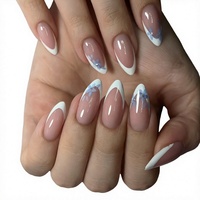 Faux ongles à presser pour femmes, rose poudré, forme amande moyenne, avec French manucure blanche et motif fleur bleue, style Jardin de Porcelaine