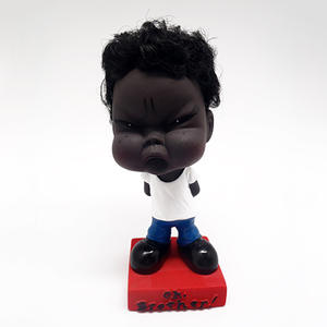 Poupée en caoutchouc noire de dessin animé à tête oscillante (Joyeuse, Triste, En colère) pour le commerce transfrontalier, décoration de chambre de maternité et ornements de voiture - Product Image 1