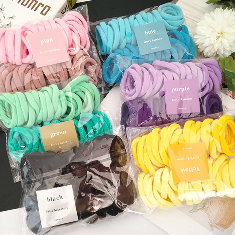 50 pçs/saco Cor dos doces Meninas cabelo banda crianças anel de cabelo colorido Elastic mulheres sem costura alta elástico elástico