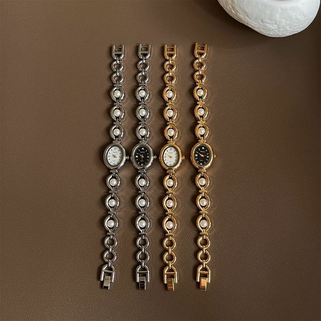 Vintage-style Women's Quartz Watch with Oval Case and Glass Dial Luxurious Alloy Strap Pointer Display for New Students Women