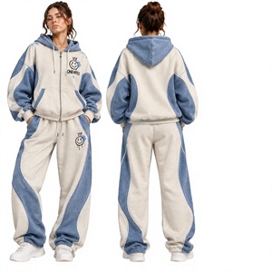 Ensemble de survêtement pour femme bleu glace et blanc avec fermeture éclair, design à empiècements de couleur, pantalon de jogging oversize, style streetwear - Product Image 1