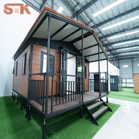 Maison modulaire préfabriquée en conteneur, prix d'usine, personnalisée, 2 chambres, 1 salon avec véranda et auvent, imperméable