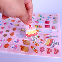 Jouets éducatifs pour enfants personnalisés, dessin animé, lavables, livre d'autocollants en gel à tenir à la main, dessin répété, fournitures de bureau et scolaires