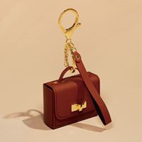 Dompet Koin Mini MOQ Rendah, Tempat Earphone, Gantungan Kunci, Tas Kecil Kulit PU, Liontin, Hadiah Wanita, Penggunaan Sehari-hari, Aksesori Penyimpanan Portabel